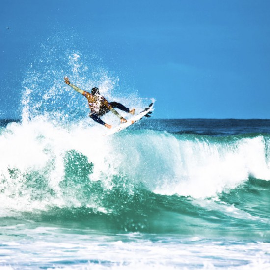 Surfer riding a wave in Hossegor